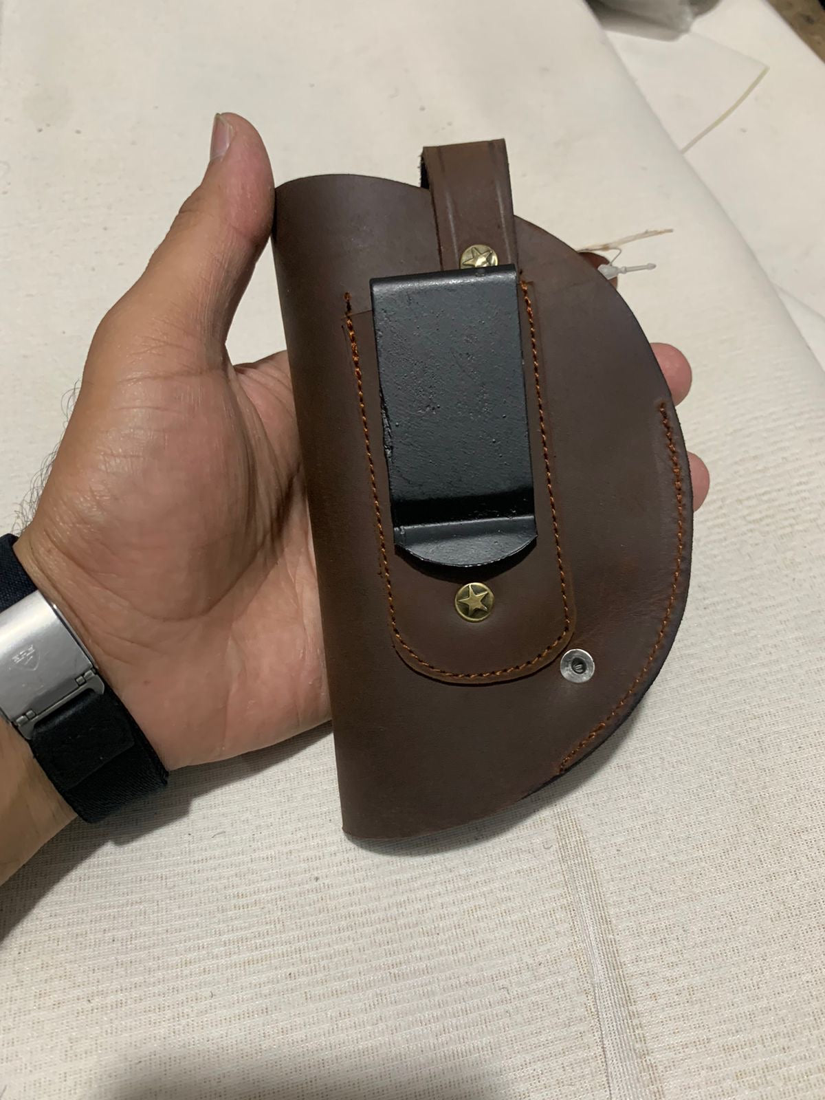 Outside waist band holster for 30 bore and 9mm Pistols